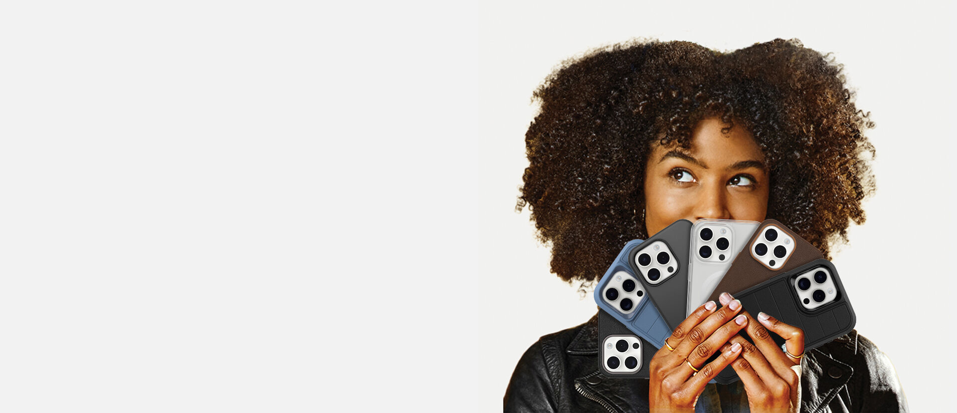 Woman holding iPhone 15 phone cases | OtterBox